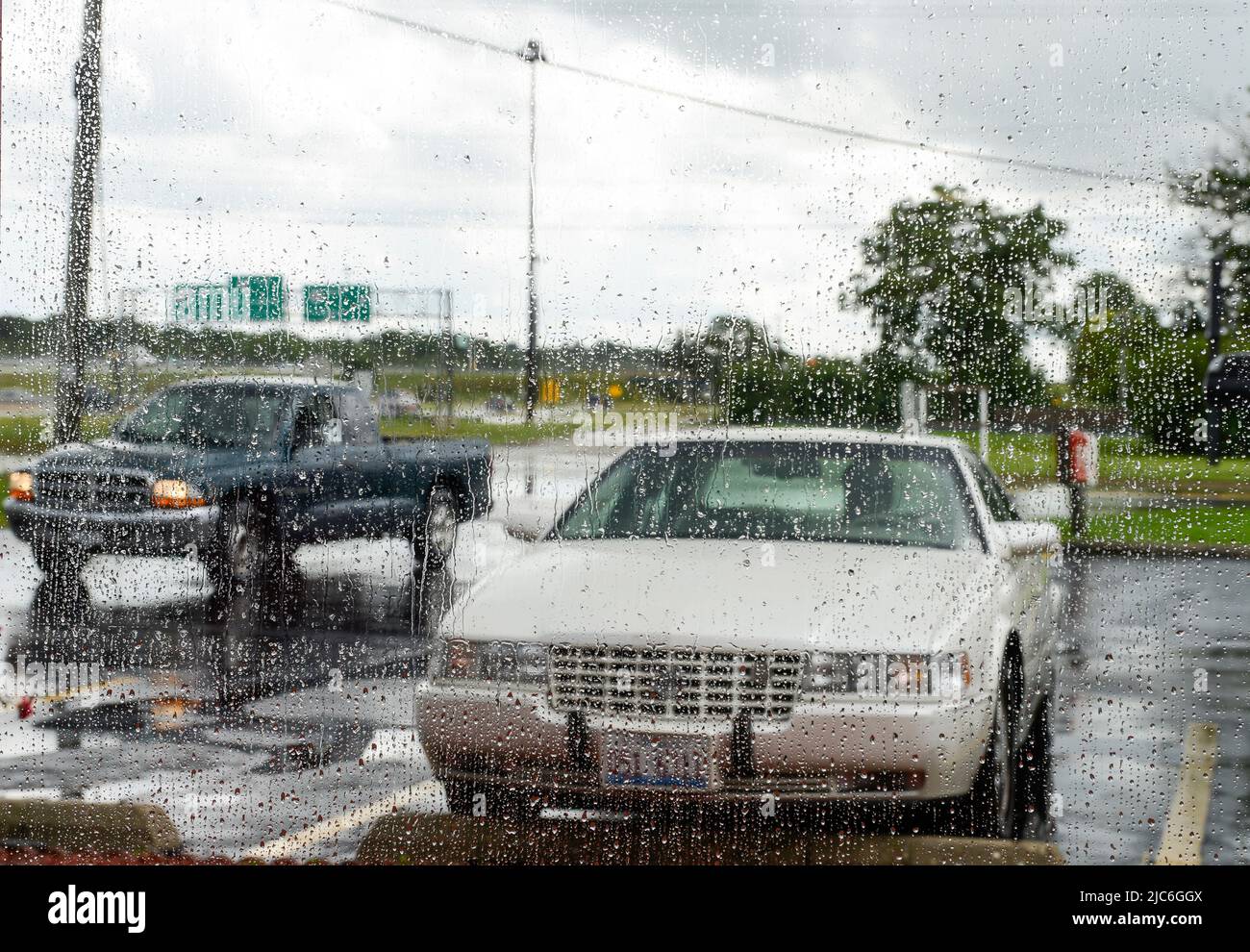 USA Illinois, parking lot of Fast Food restaurant during rain Stock Photo