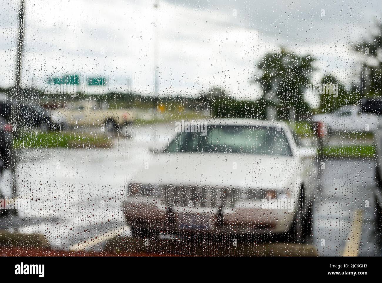 USA Illinois, parking lot of Fast Food restaurant during rain Stock Photo