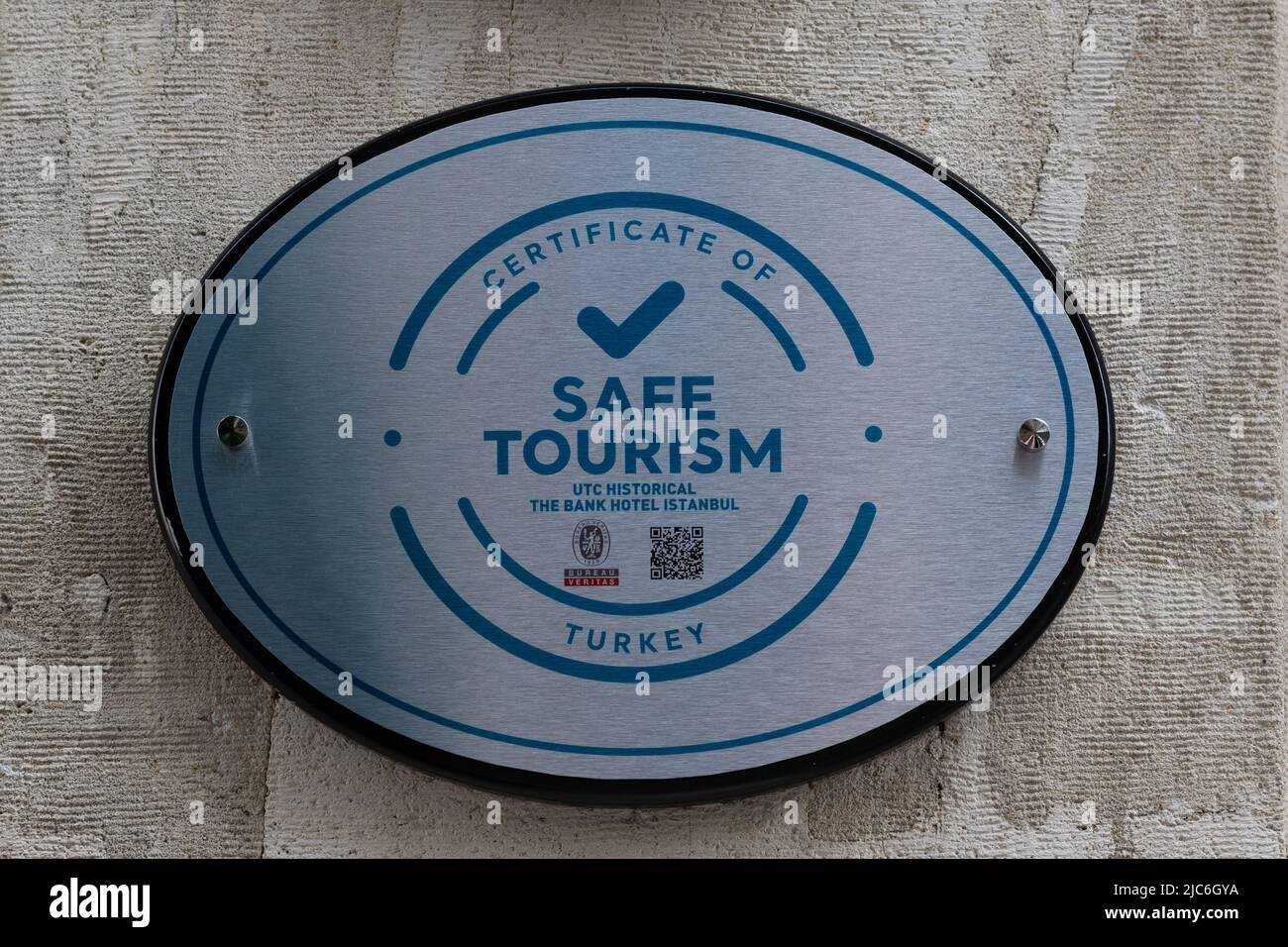 Certificate of Safe Tourism Turkey plaque outside The Bank Hotel, Istanbul, Turkey Stock Photo