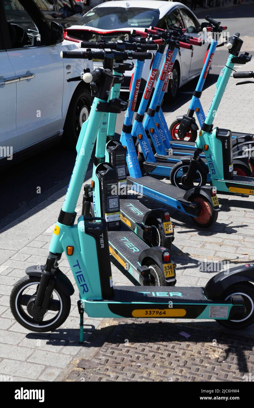 England, London,  Trafalgar Square, E-scooters for hire. Stock Photo