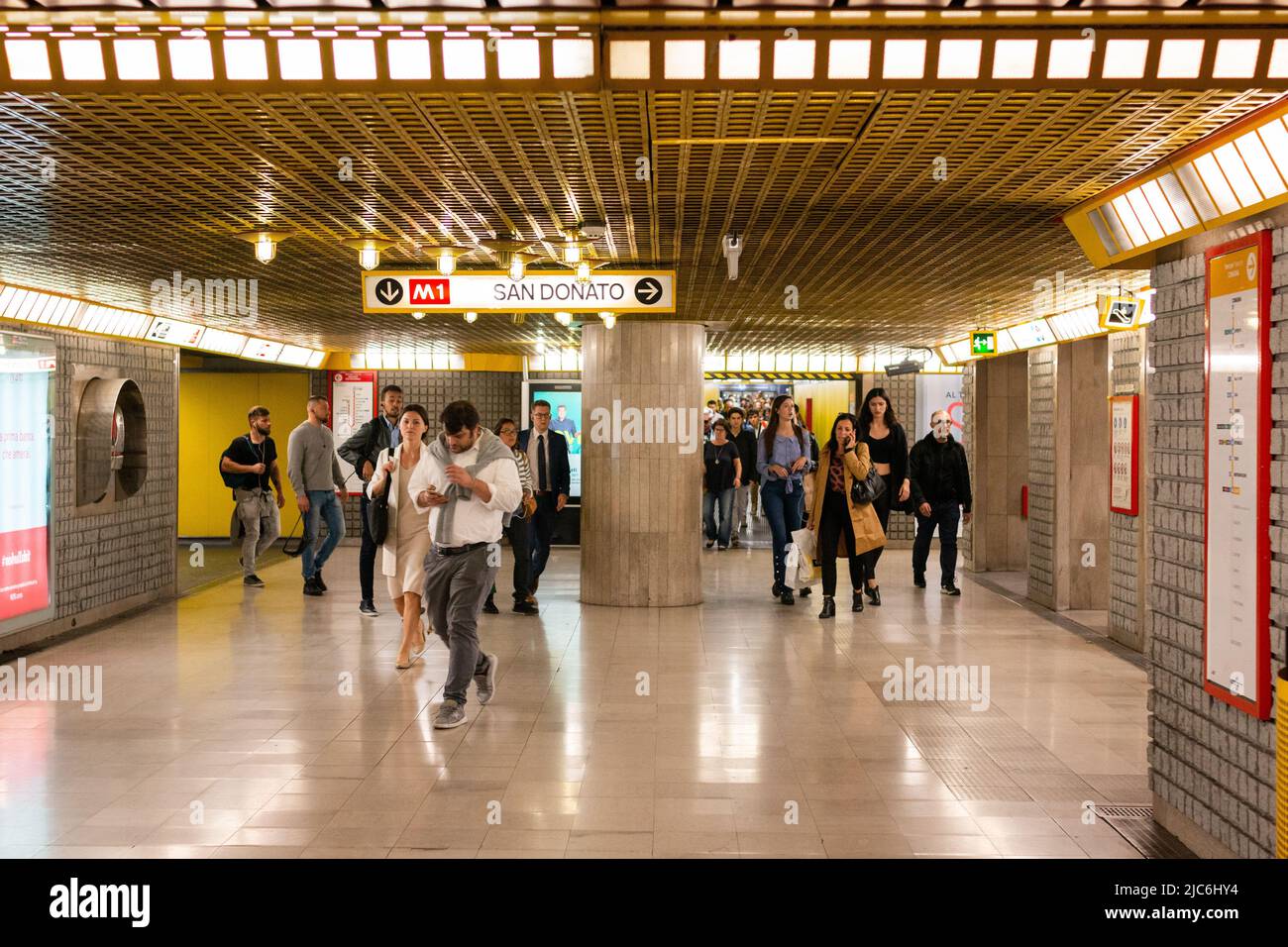 October 3, 2019, Milan, Lombardy, Italy: Comuters and travelers pass through the Duomo metro station in Milan Italy on October 3, 2018. This is one of the largest stations in the city and is located right in the city center. The metro lines M1 and M3 connect here. (Credit Image: © Mychelle Vincent/Alto Press via ZUMA Press) Stock Photo