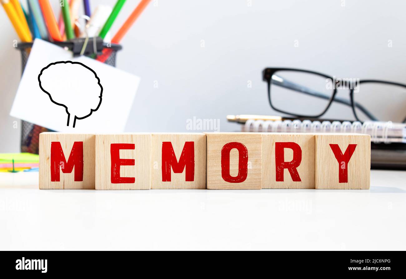 Memory - word from wooden blocks with letters, to remember information ...