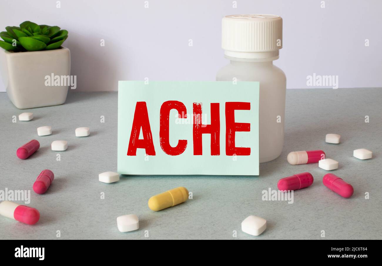 Wooden block form the word Ache with stethoscope on the doctor #39 s