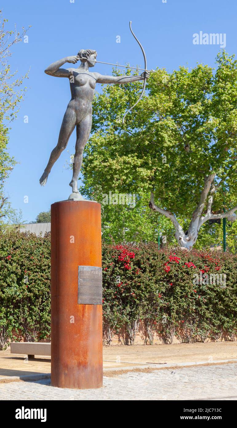 Bronze (patinated) statue (2019) of Diana Cazadora (the huntress) by Ricardo Suárez, Muelle de Neuva York, Seville, Spain. Stock Photo