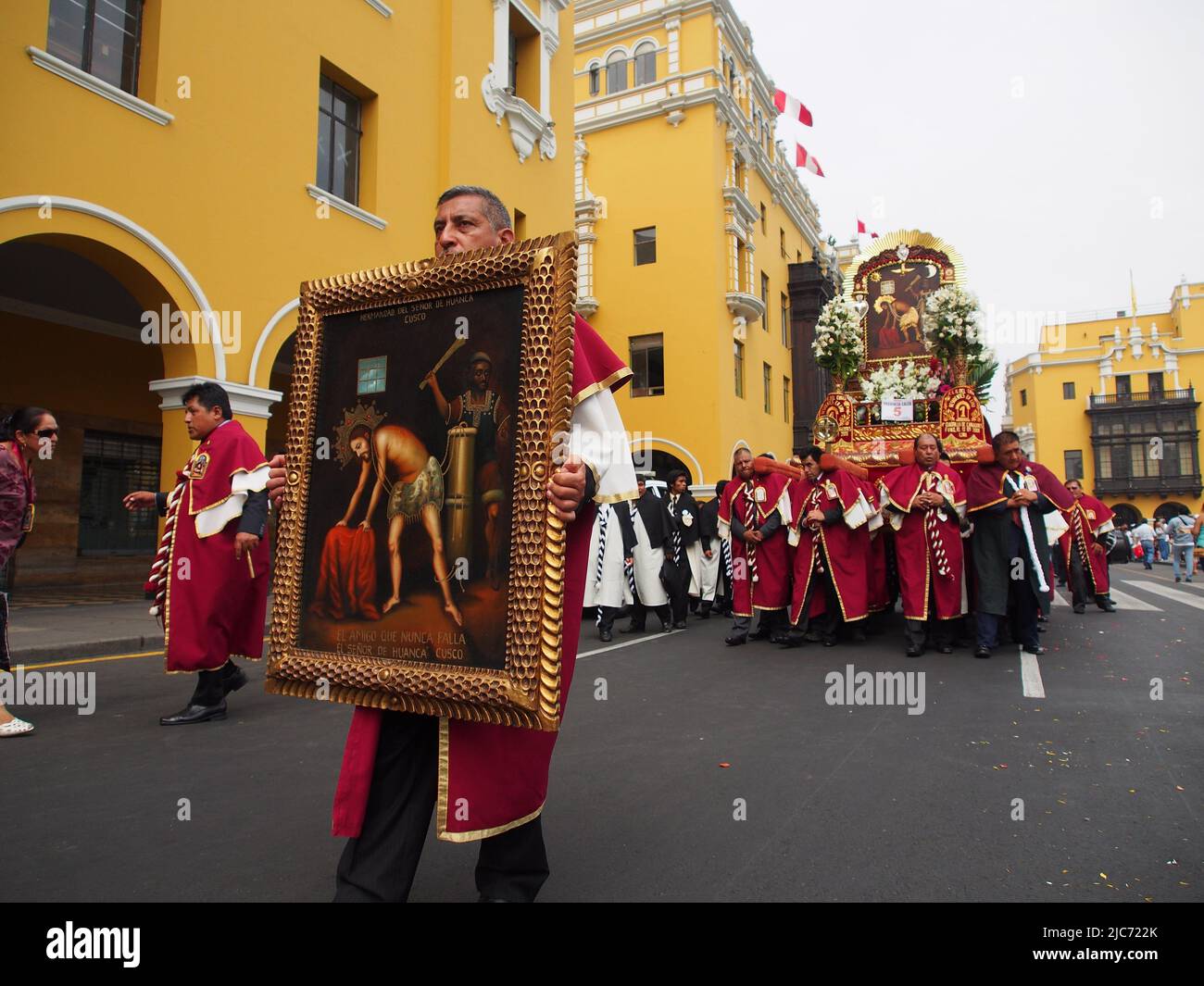 Devatees of Lord of Qoyllur Riti, carrying a religious litter. Hundreds of people accompanied the images of the Quechua-speaking vicarage of San Sebastian and Monserrate, who went out in procession, greeting the City of Lima for the 482 anniversary of its foundation. Stock Photo