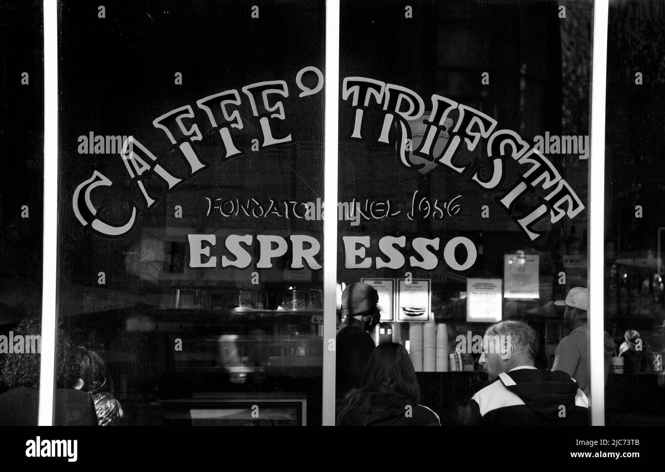 Customers enjoy coffee, espresso and pastries at the iconic Caffe Trieste in the Little Italy district of San Francisco, California. Stock Photo