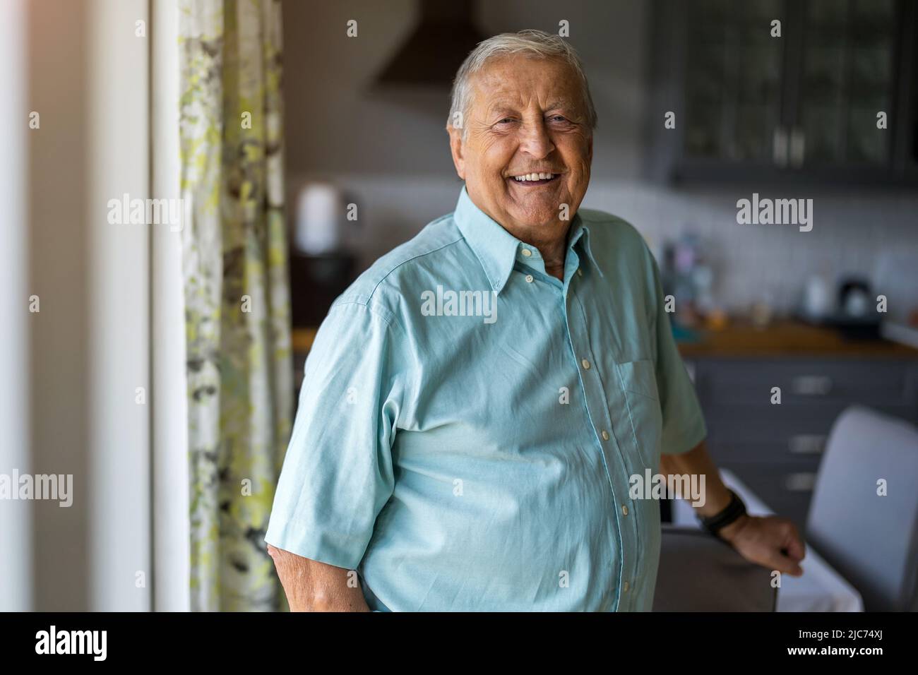 Portrait happy older man home hi-res stock photography and images - Alamy