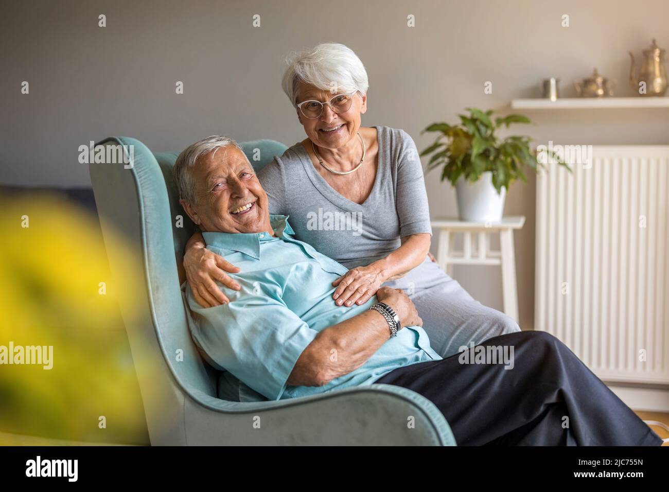 Happy senior couple at home Stock Photo