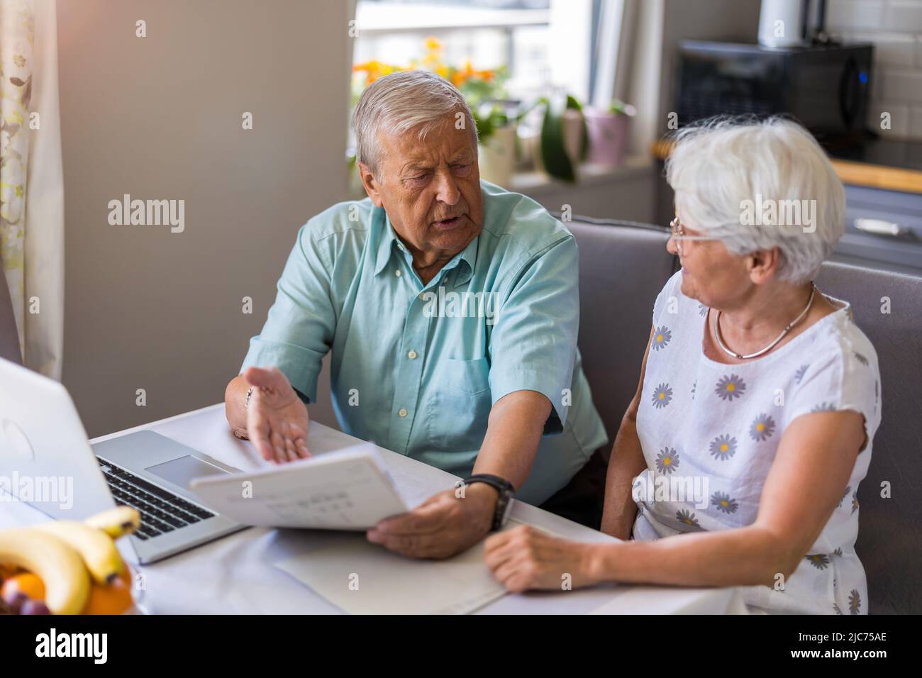 Senior couple going through their financials problems Stock Photo