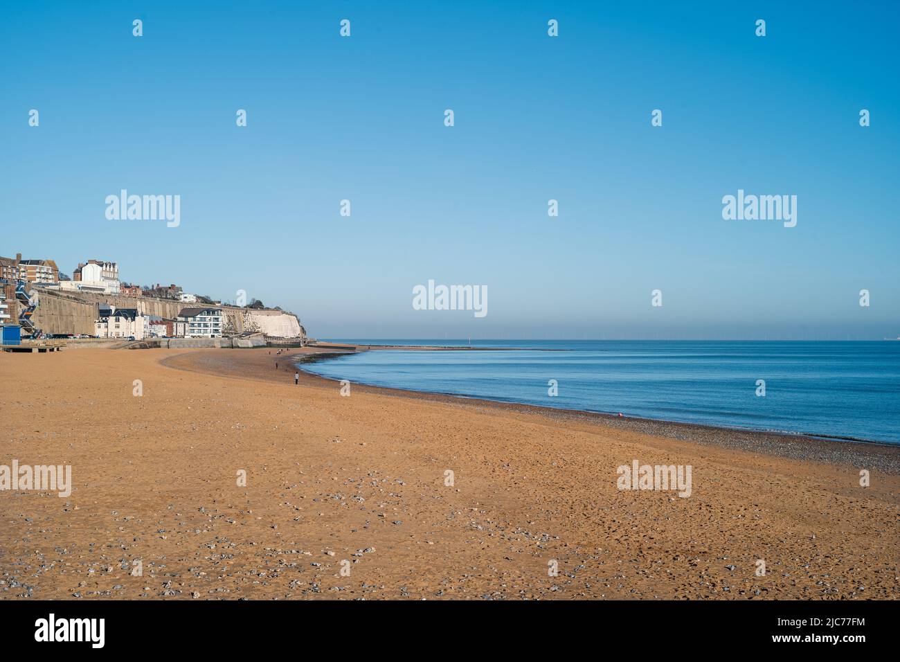 Ramsgate main sands beach in winter on a bight day with a blue sky. Stock Photo