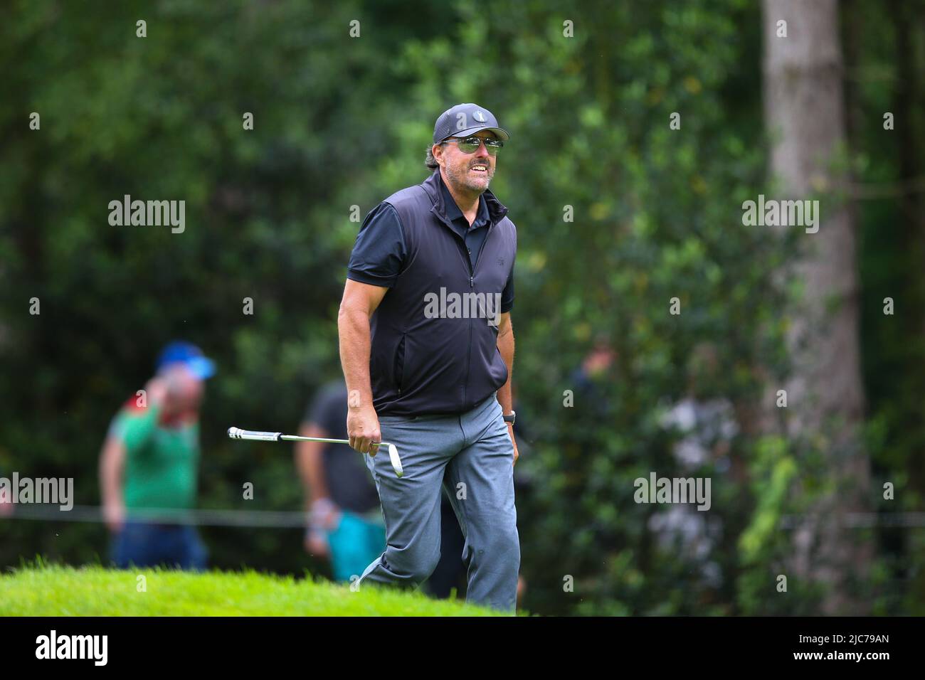 ST ALBANS, ENGLAND - JUNE 09: Phil Mickelson of the United States walks down the 3rd hole during day one of the LIV Golf Invitational at The Centurion Club on June 9, 2022 in St Albans, England. (MB Media) Stock Photo