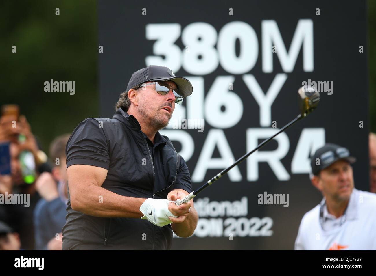 ST ALBANS, ENGLAND - JUNE 09: Phil Mickelson of the United States tees off on the 8th hole during day one of the LIV Golf Invitational at The Centurion Club on June 9, 2022 in St Albans, England. (MB Media) Stock Photo