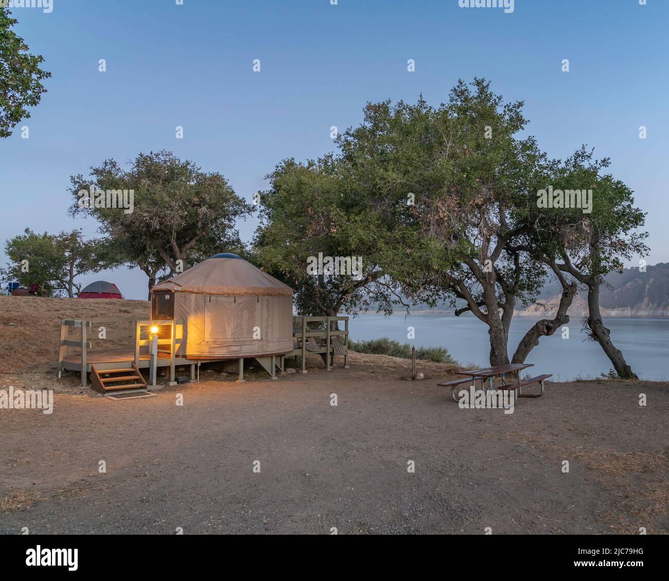 A yurt overlooks Lake Cachuma in Santa Barbara county, CA. Stock Photo
