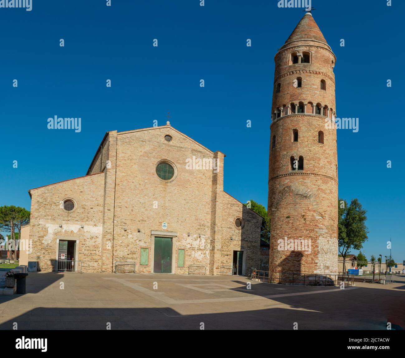 The characteristic bell tower of the Cathedral of Caorle Stock Photo