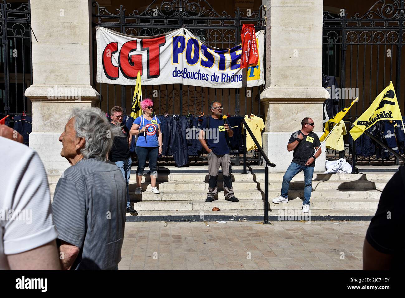 A trade unionist postal worker speaks during the demonstration. The Marseille postal workers held a strike against the reorganisation of rounds in the 1st, 2nd, 3rd, 4th and 14th arrondissements of Marseille which would lead to job cuts. Stock Photo