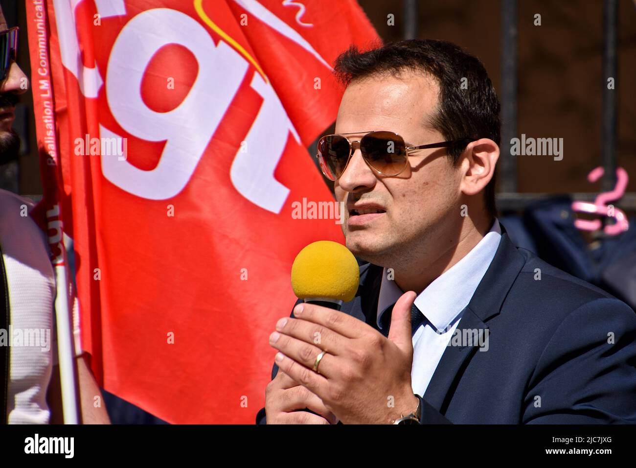 Marseille, France. 9th June, 2022. Communist senator Jeremy Bacchi is seen speaking during the protest. The Marseille postal workers held a strike against the reorganisation of rounds in the 1st, 2nd, 3rd, 4th and 14th arrondissements of Marseille which would lead to job cuts. (Credit Image: © Gerard Bottino/SOPA Images via ZUMA Press Wire) Stock Photo