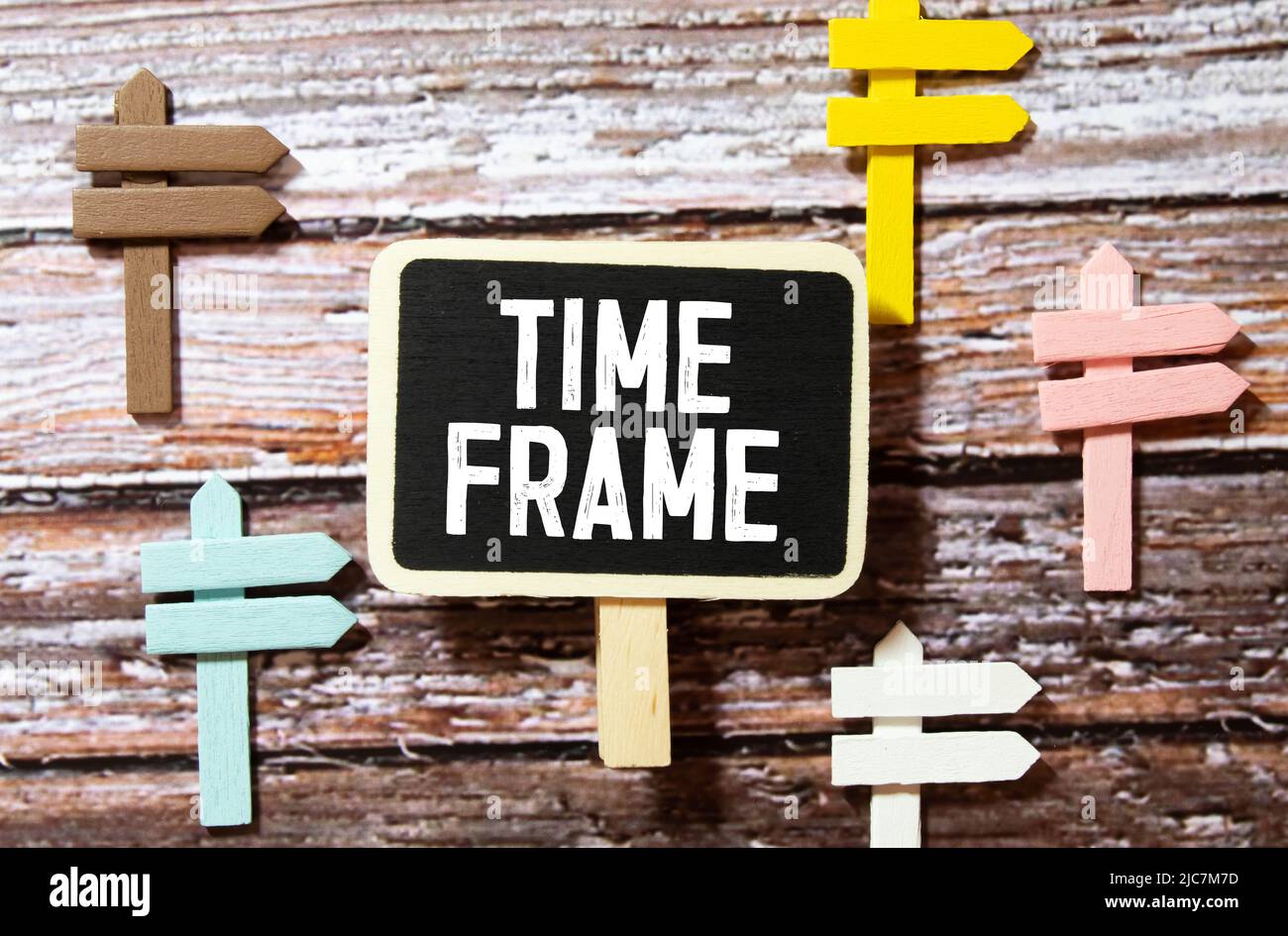 Kraft paper frame hanging on lacing on white wall background with space