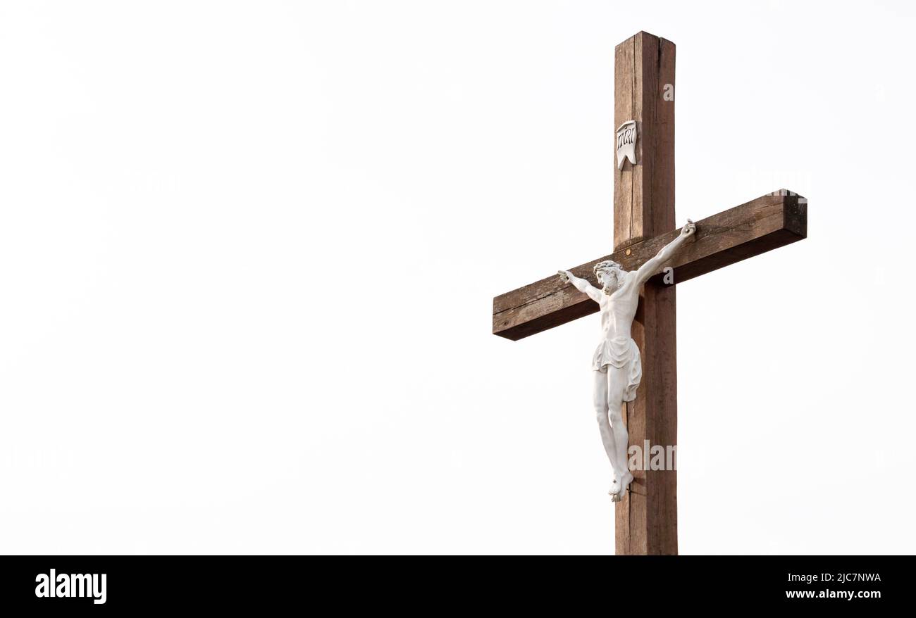 Orthodox culture of exhibiting a wooden cross on the street near the road or village, part of the Christian cross Stock Photo