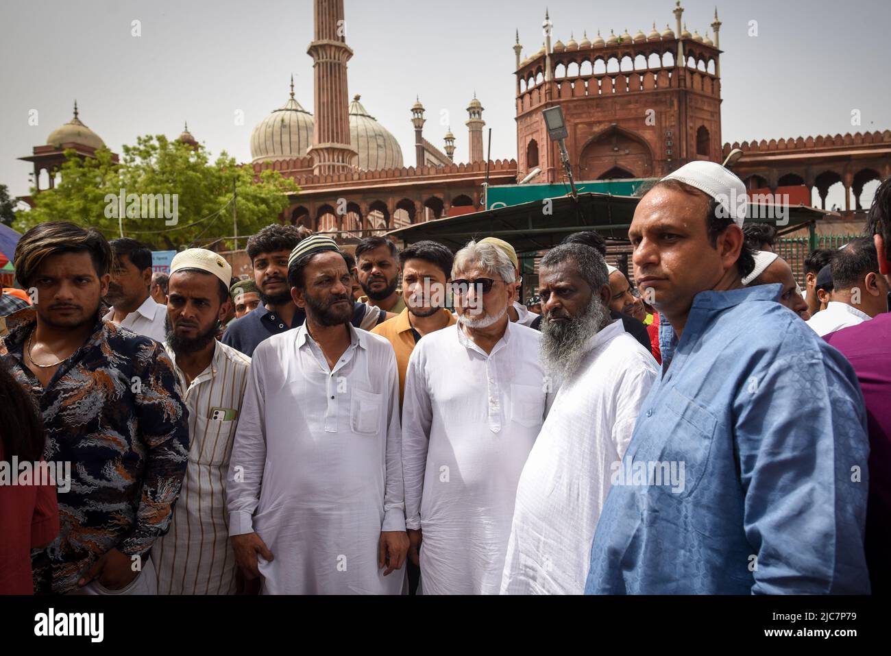 NEW DELHI, INDIA - JUNE 10: Members of the Muslim community gathered in front of Jama Masjid during a protest against the remarks made on Prophet Muhammad by now suspended BJP spokesperson Nupur Sharma and Naveen Jindal on June 10, 2022 in New Delhi, India. Protests erupted in several parts of the country on Friday against former Bharatiya Janata Party spokesperson Nupur Sharma's comment's on Prophet Muhammad. Protests in Uttar Pradesh's Prayagraj and Jharkhand's Ranchi turned violent where police had to resort to lathi-charge and aerial firing. The police had to resort to lathi-charge in West Stock Photo