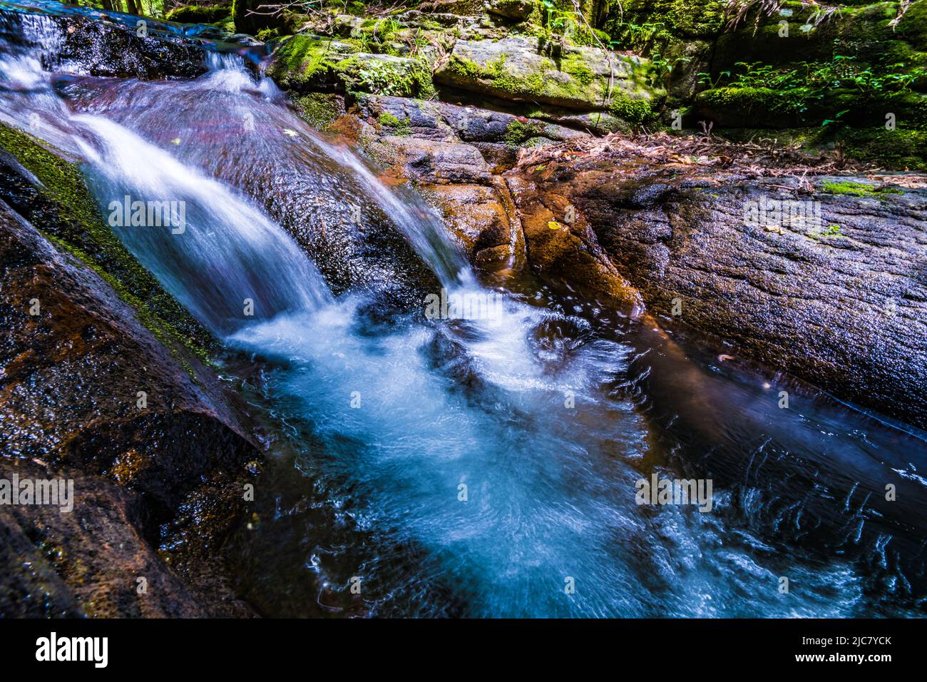 Tiny waterfall in a satoyama Stock Photo