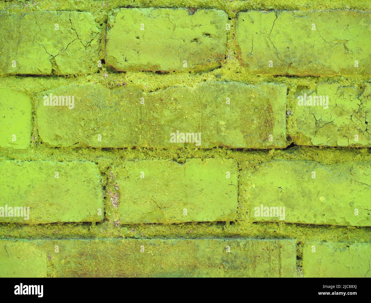 green brick wall useful as a background Stock Photo - Alamy