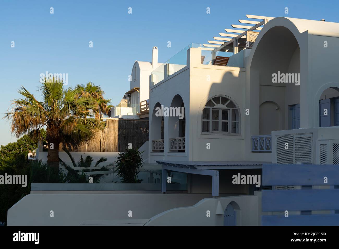 Elegant appartment buildings in cycladic style in Akrotiri on Santorini island Stock Photo