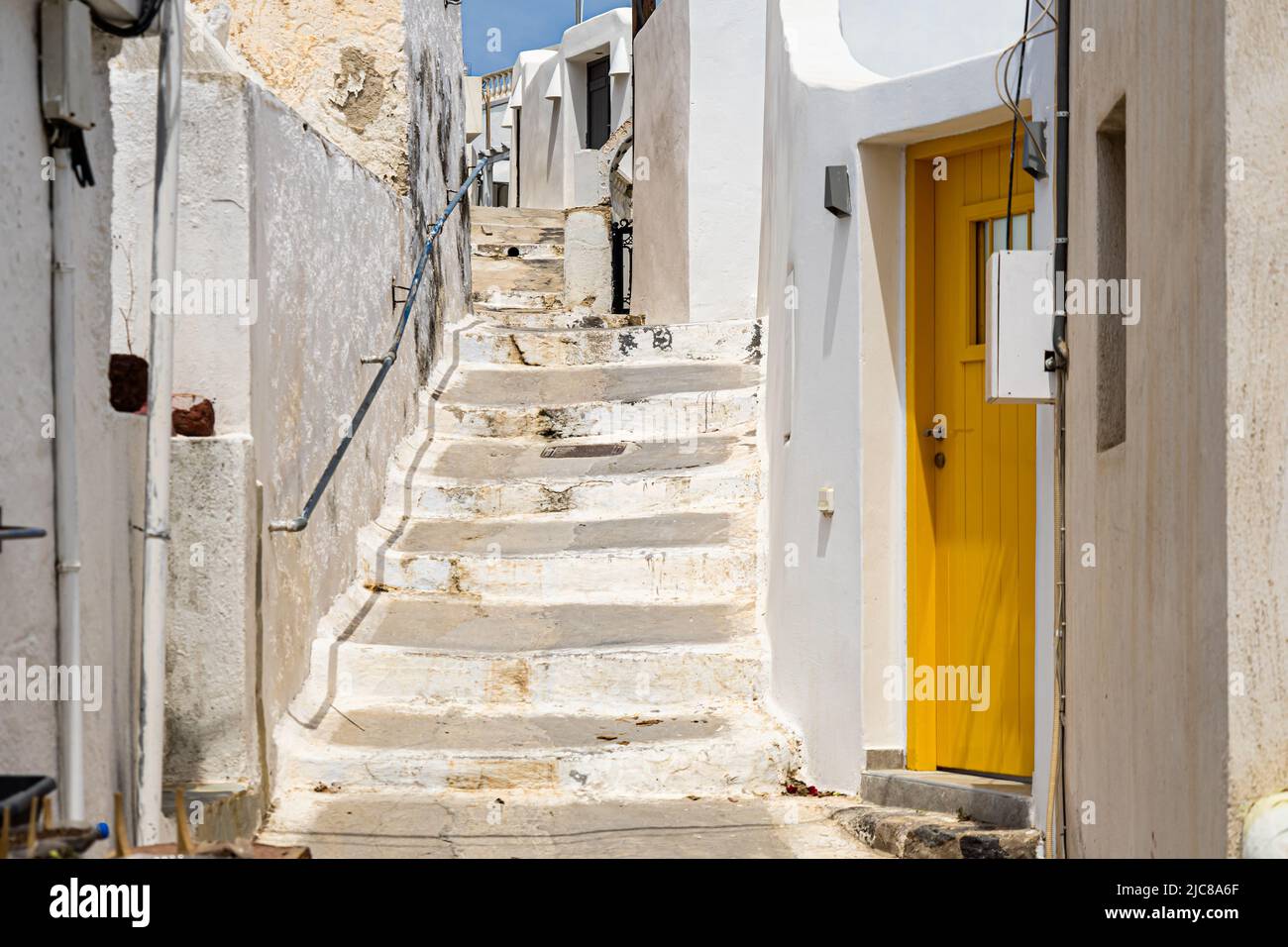 Santorini: A sunny side alley in Megalochori Stock Photo