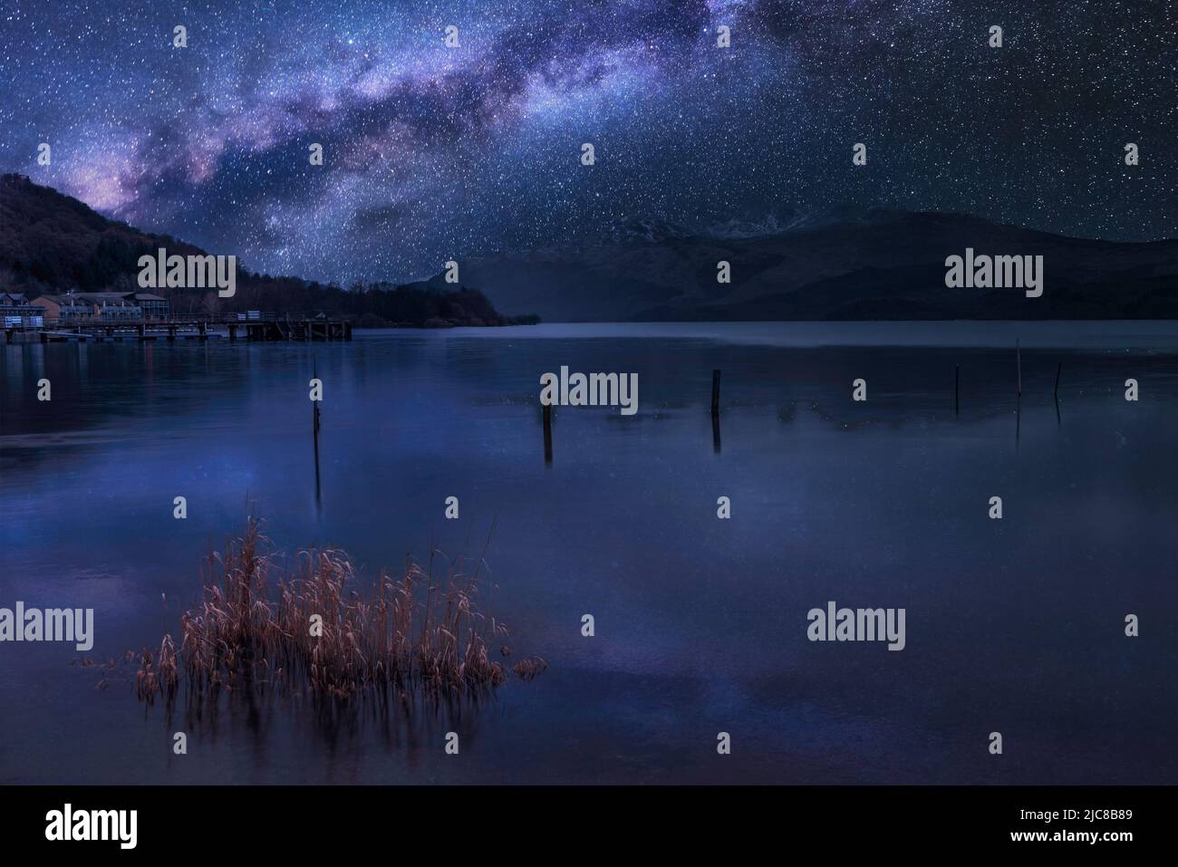 Stunning vibrant Milky Way composite image over landscape of Loch ...