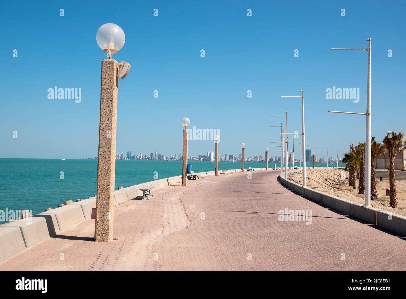 A walkway following the Persian Gulf on the Green Island of Kuwait City, Kuwait Stock Photo