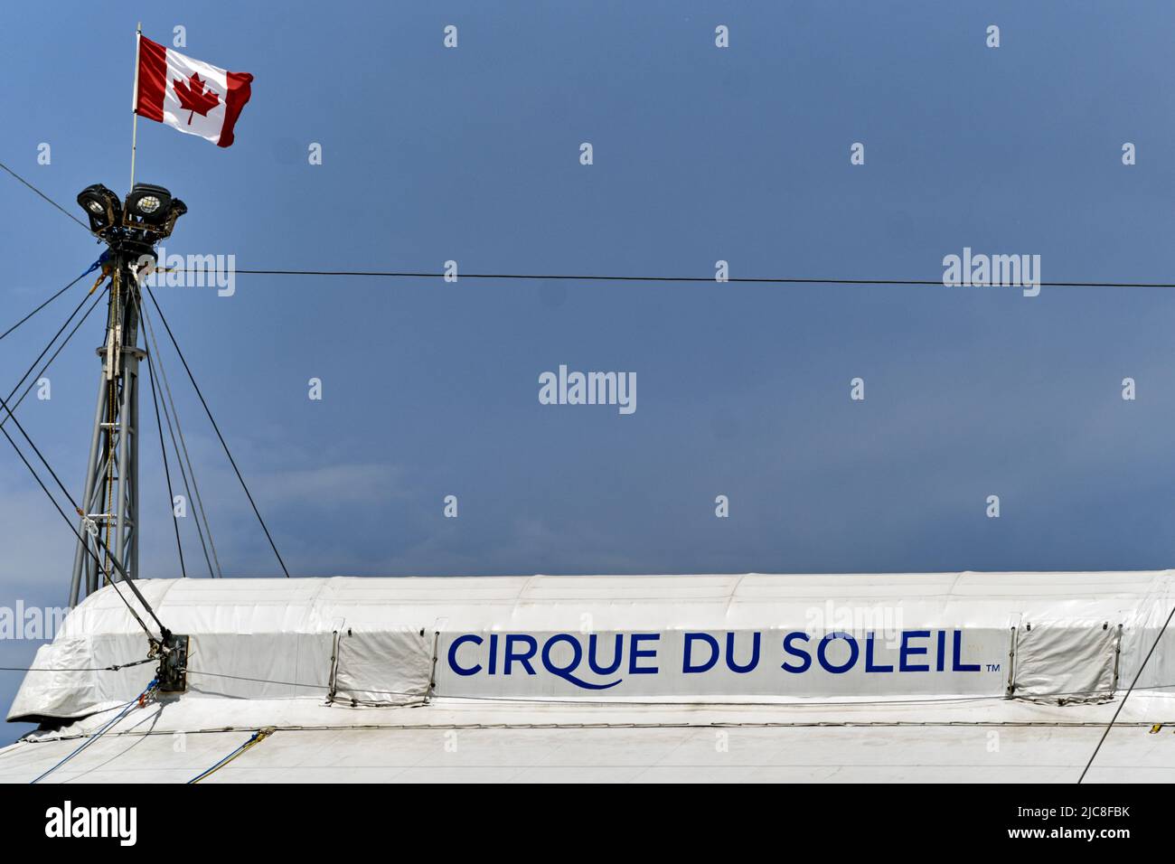 Geneva, Switzerland - may 28, 2022 : sign at top of the tent of the Cirque du Soleil , a Canadian entertainment company circus producer Stock Photo