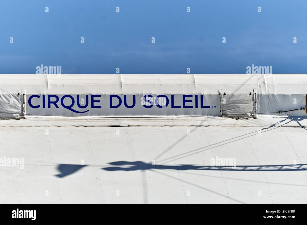 Geneva, Switzerland - may 28, 2022 : sign at top of the tent of the Cirque du Soleil , a Canadian entertainment company circus producer Stock Photo