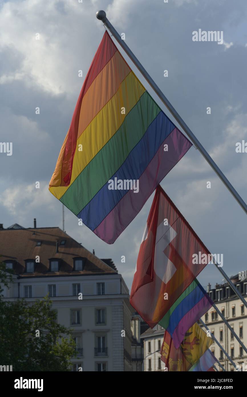 Rainbow flag, a symbol for the LGBT community, waving in the wind with ...