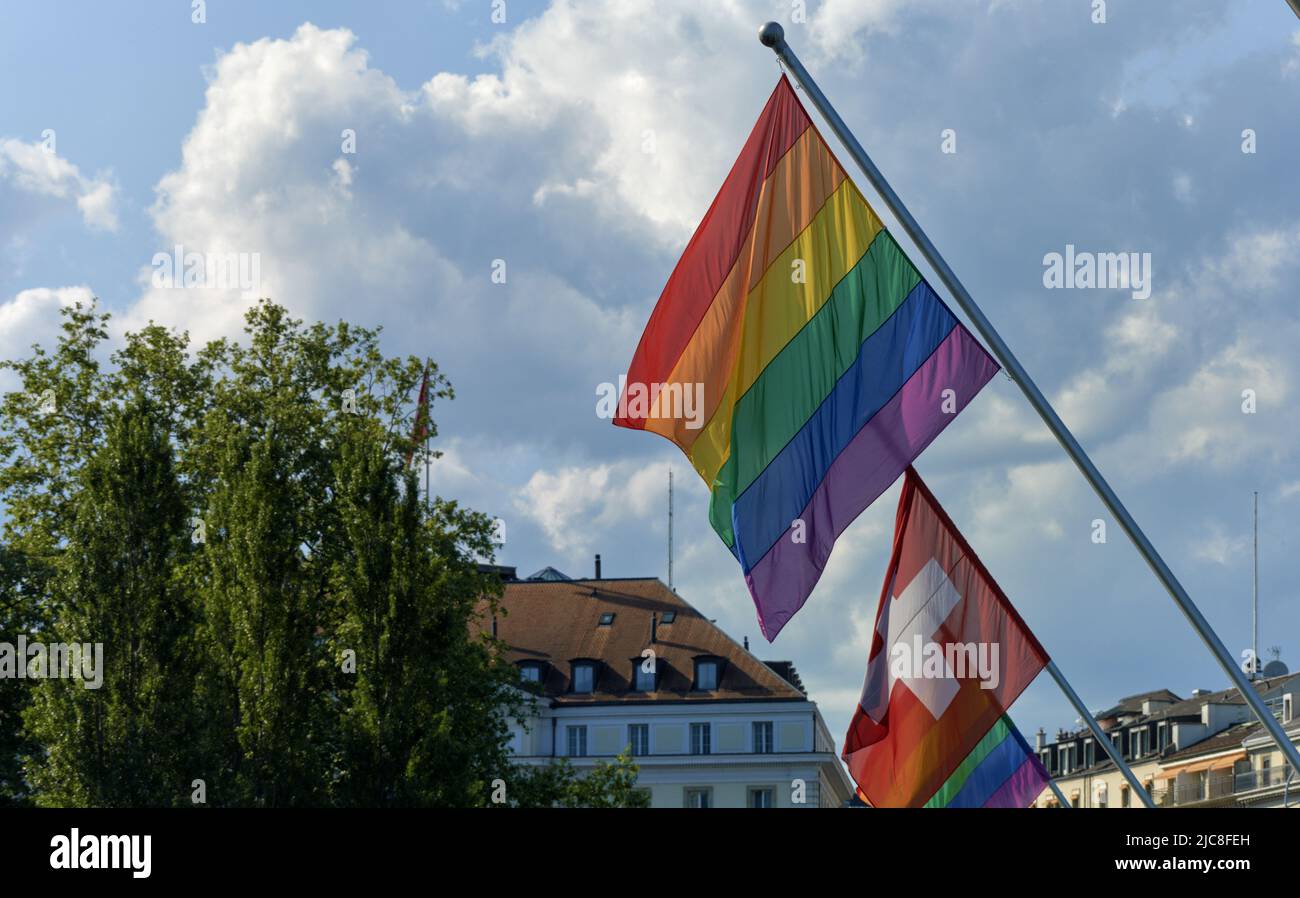 Rainbow flag, a symbol for the LGBT community, waving in the wind with ...