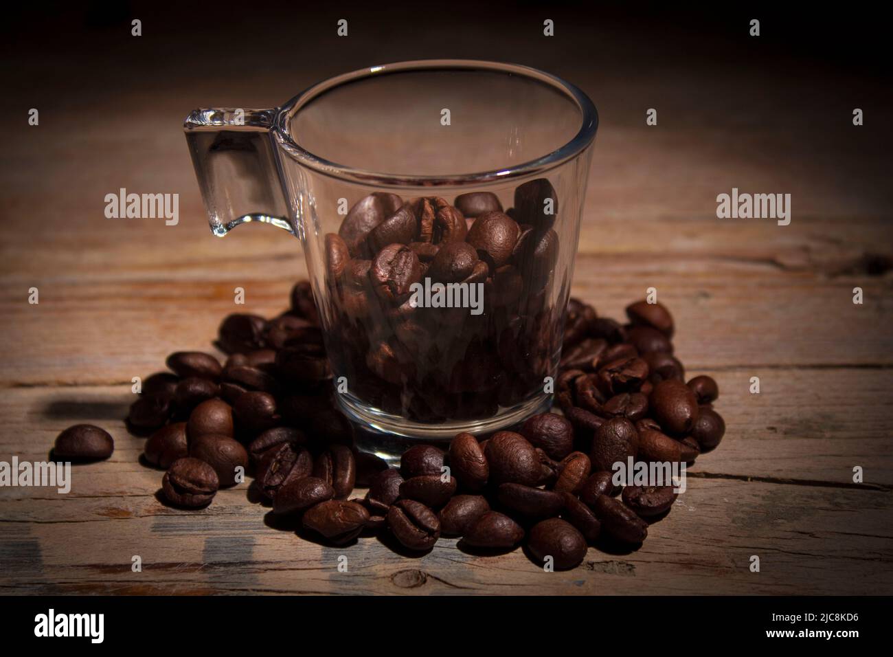 Photograph of glass cup with coffee beans Stock Photo