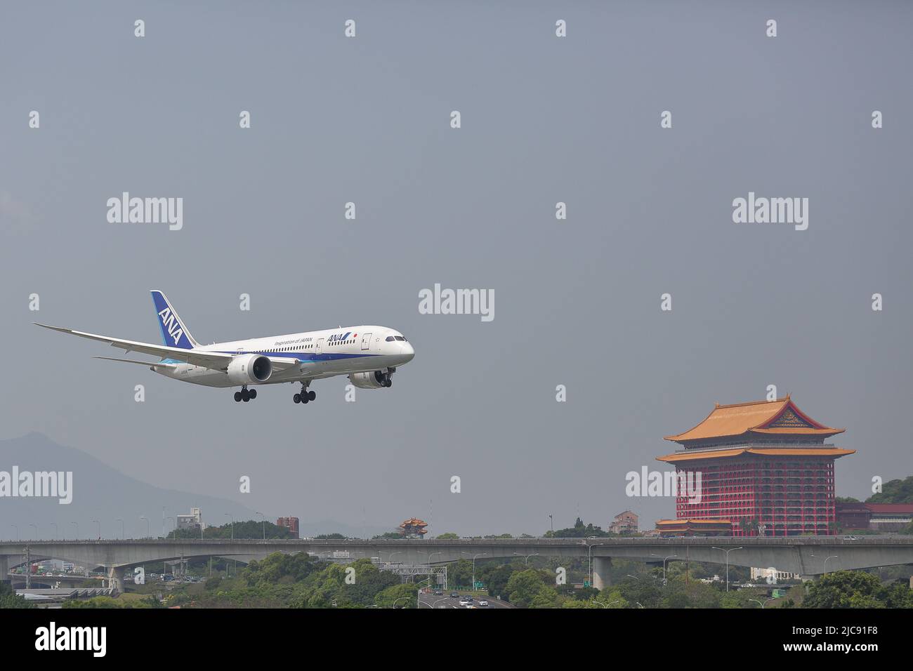 JA831A All Nippon Airways Boeing 787-8 Dreamliner (ANA NH851) from Tokyo (Haneda) (HND) is about to land to Taipei Songshan Airport (TSA). Stock Photo