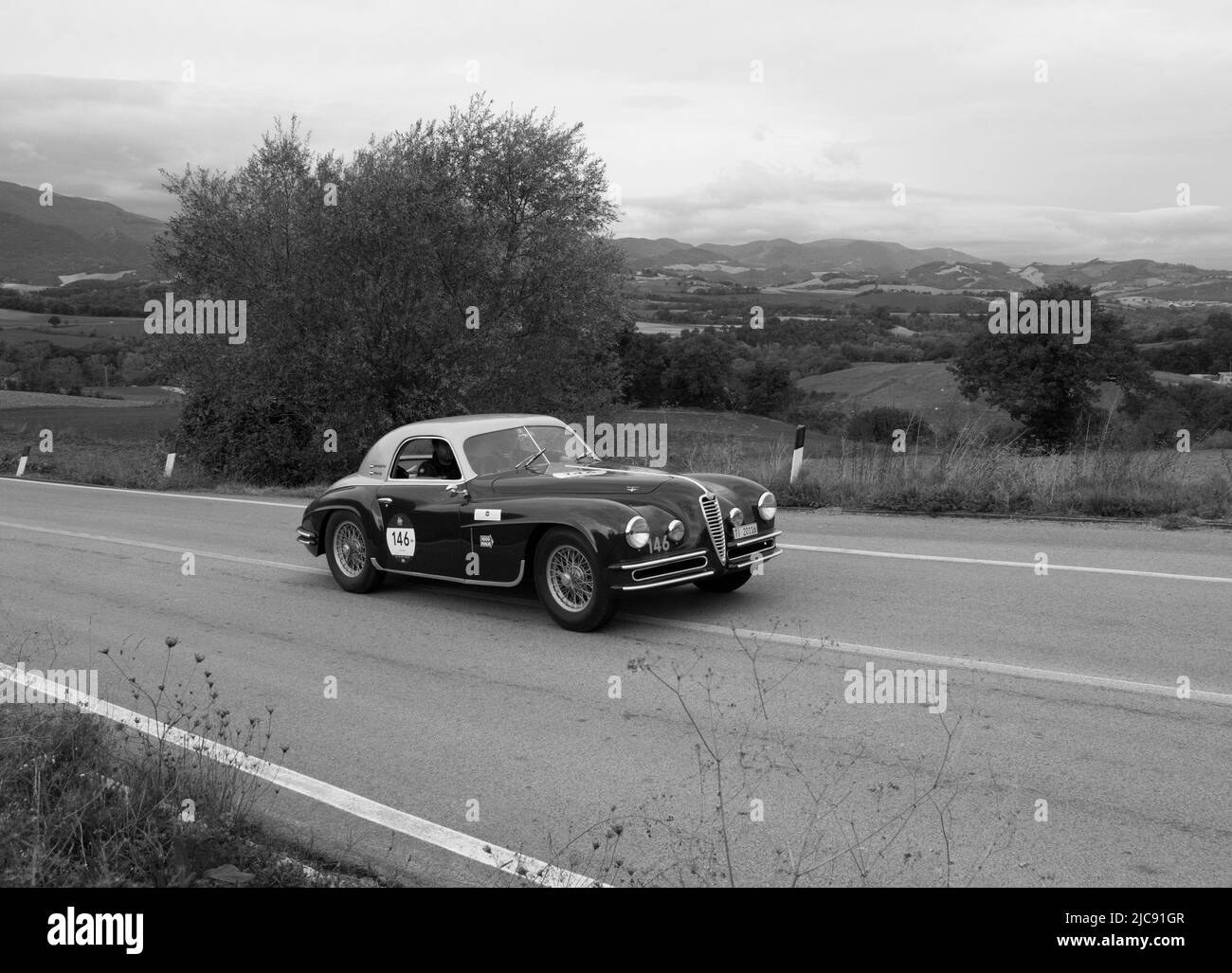 CAGLI , ITALY - OTT 24 - 2020 : ALFA ROMEO 6C 2500 SUPER SPORT 1949 on an old racing car in rally Mille Miglia 2020 the famous italian historical race Stock Photo