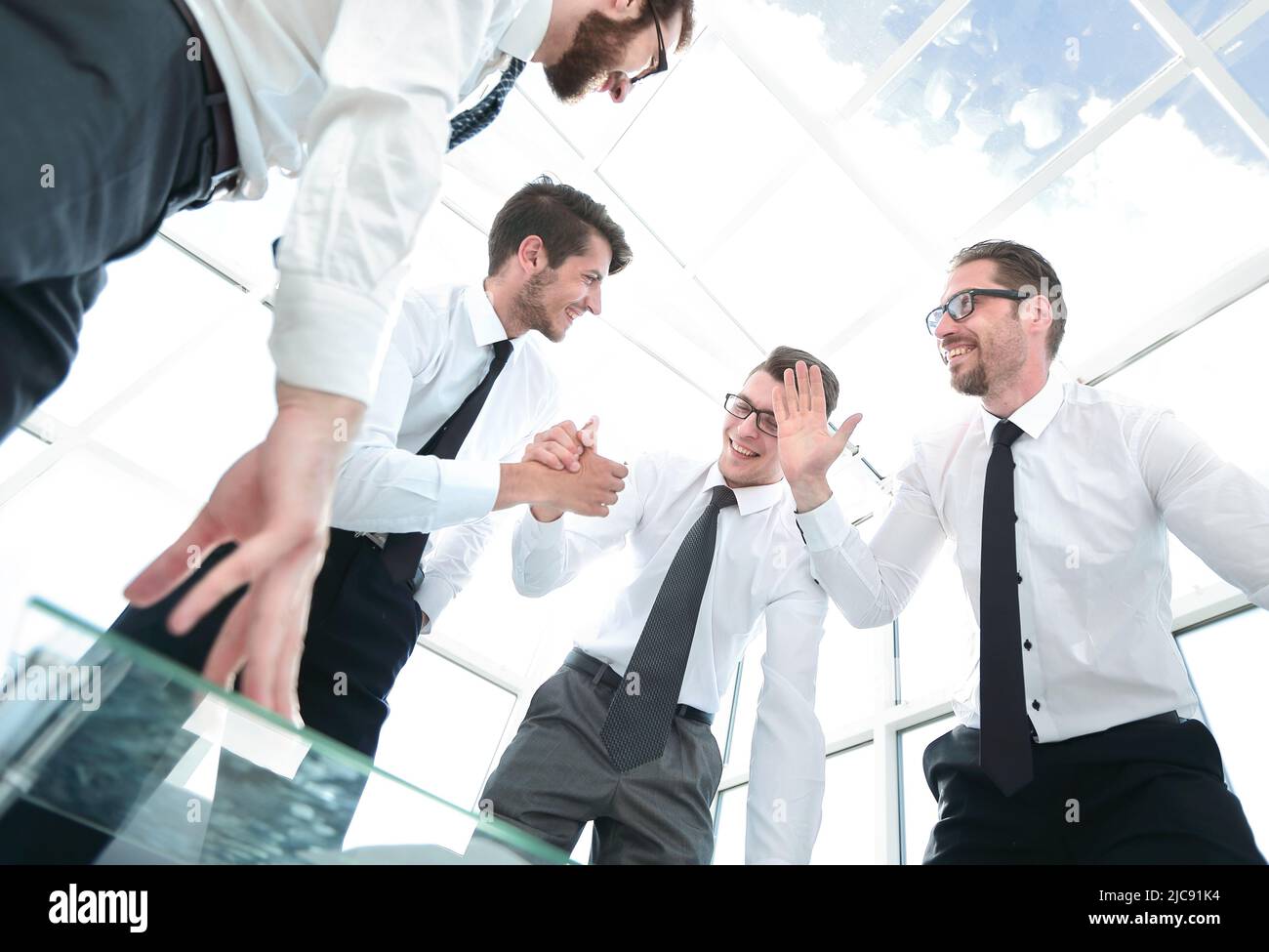 bottom view.happy business team celebrating victory Stock Photo