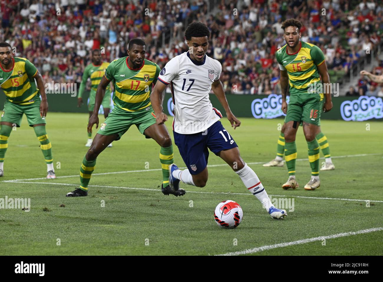 Austin, Texas USA, 10th June, 2022: USA's MALIK TILLMAN (17) heads to the goal defended by TYRONE STERLING of Grenada (17 in green) during second half action of a CONCACAF Nation's League match at Austin's Q2 Stadium. This is the U.S. Men's National Team's (USMNT) final match in the U.S. before the 2022 FIFA World Cup. Credit: Bob Daemmrich/Alamy Live News Stock Photo