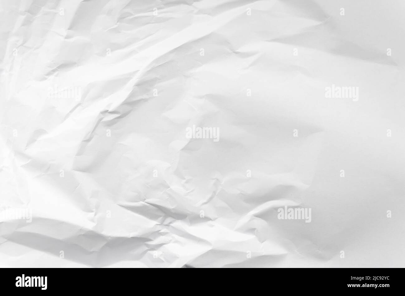 Abstract background of crumpled white paper with copy space Stock Photo