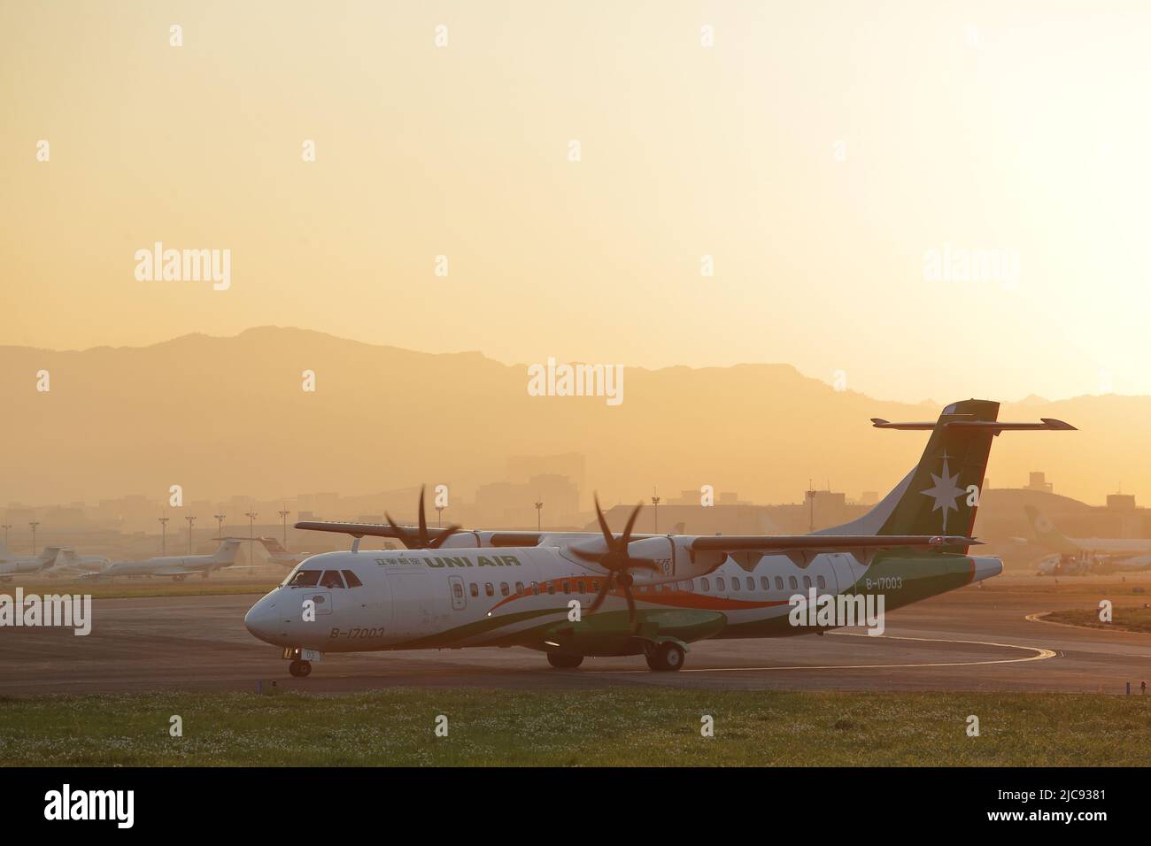 B-17003 UNI Airways ATR 72-600 on the runway is going to take off from Taipei Songshan Airport (TSA, RCSS) in the morning. Stock Photo