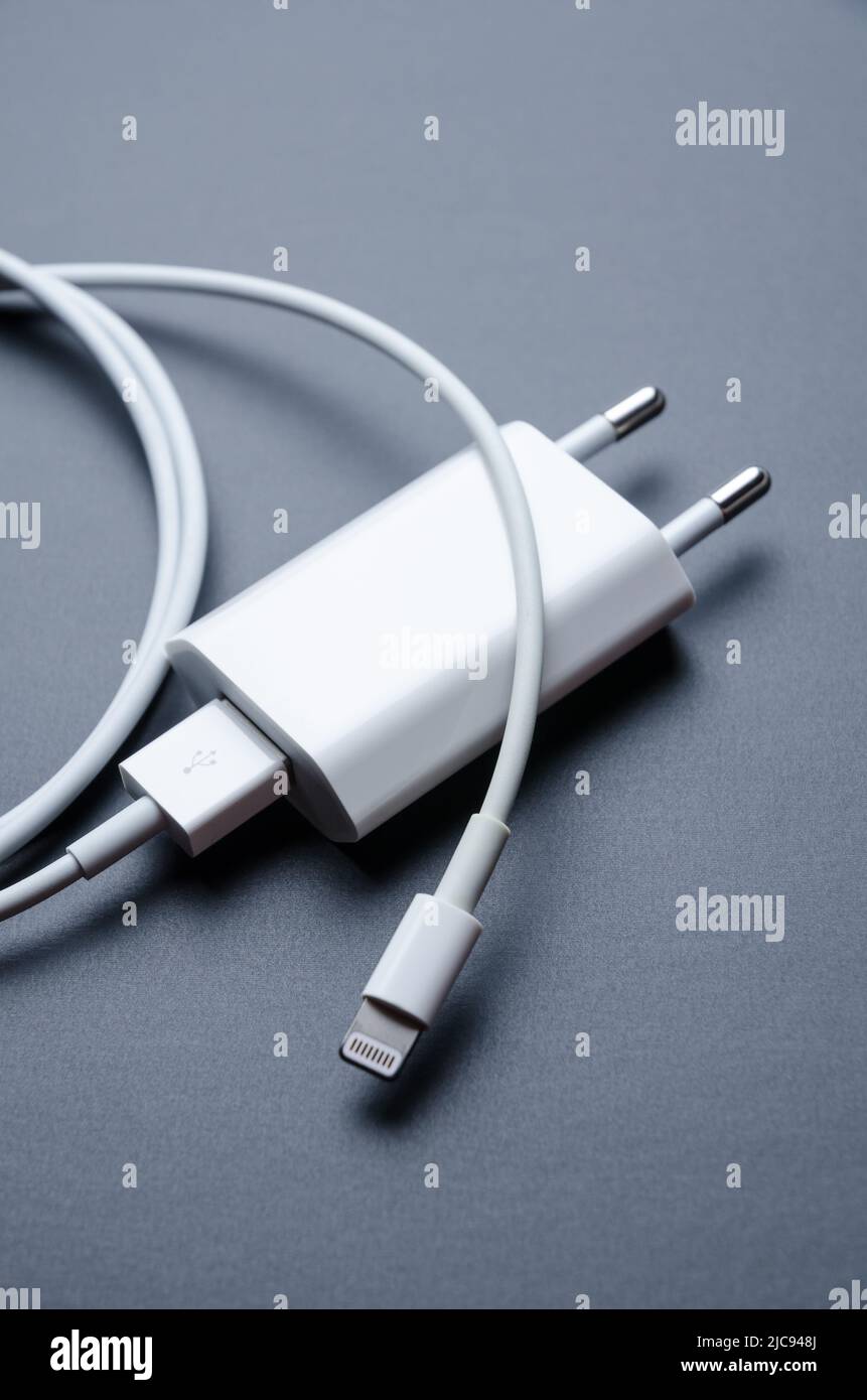 Apple iPhone lightning charger and USB cable for charging Stock Photo
