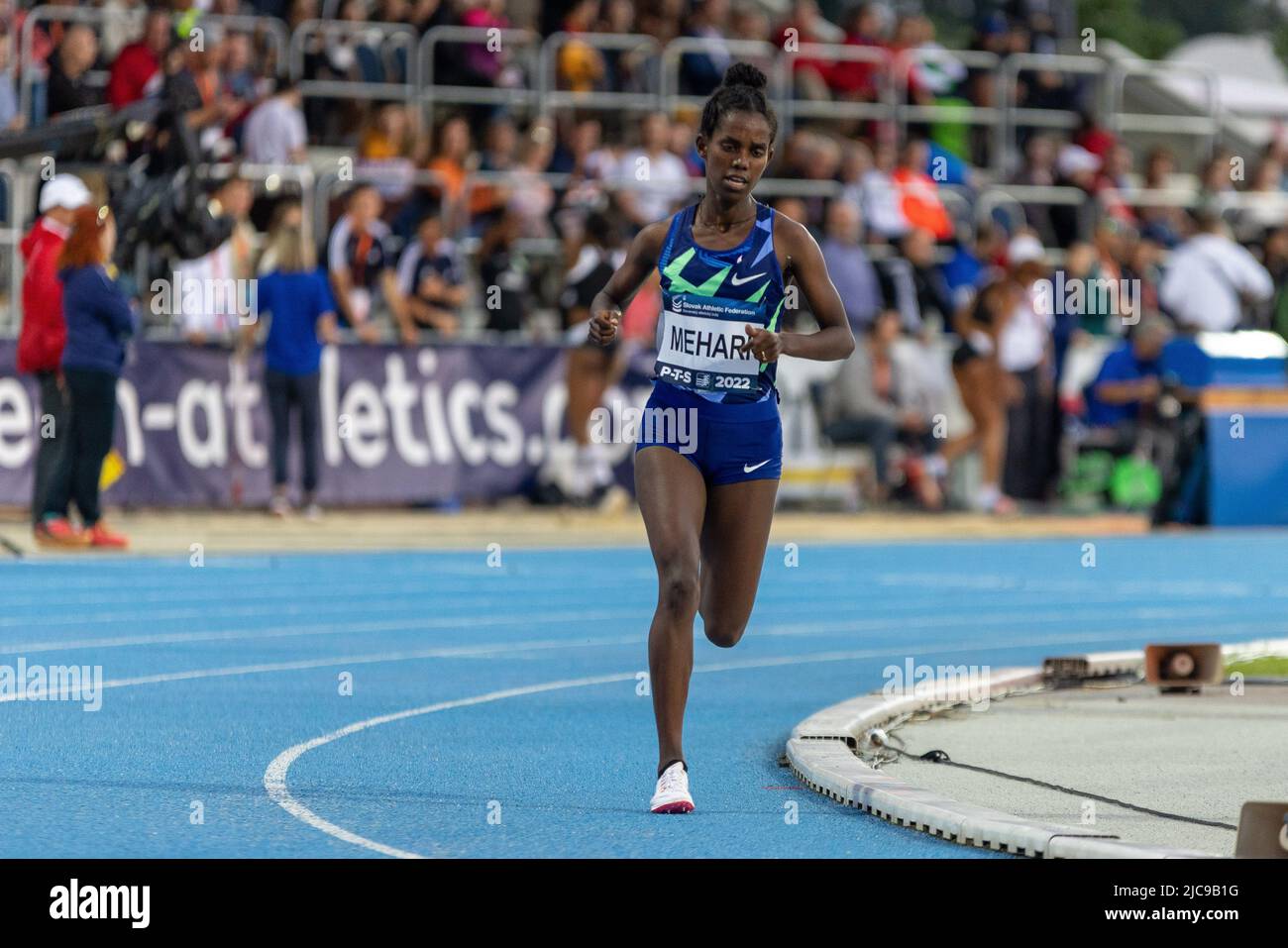 Ethiopian runner Hiwot Mehari competes in the Women's 5000 metres at the P-T-S athletics meeting in the sports site of x-bionic sphere® in Šamorín, Slovakia, 9. June 2022 Stock Photo