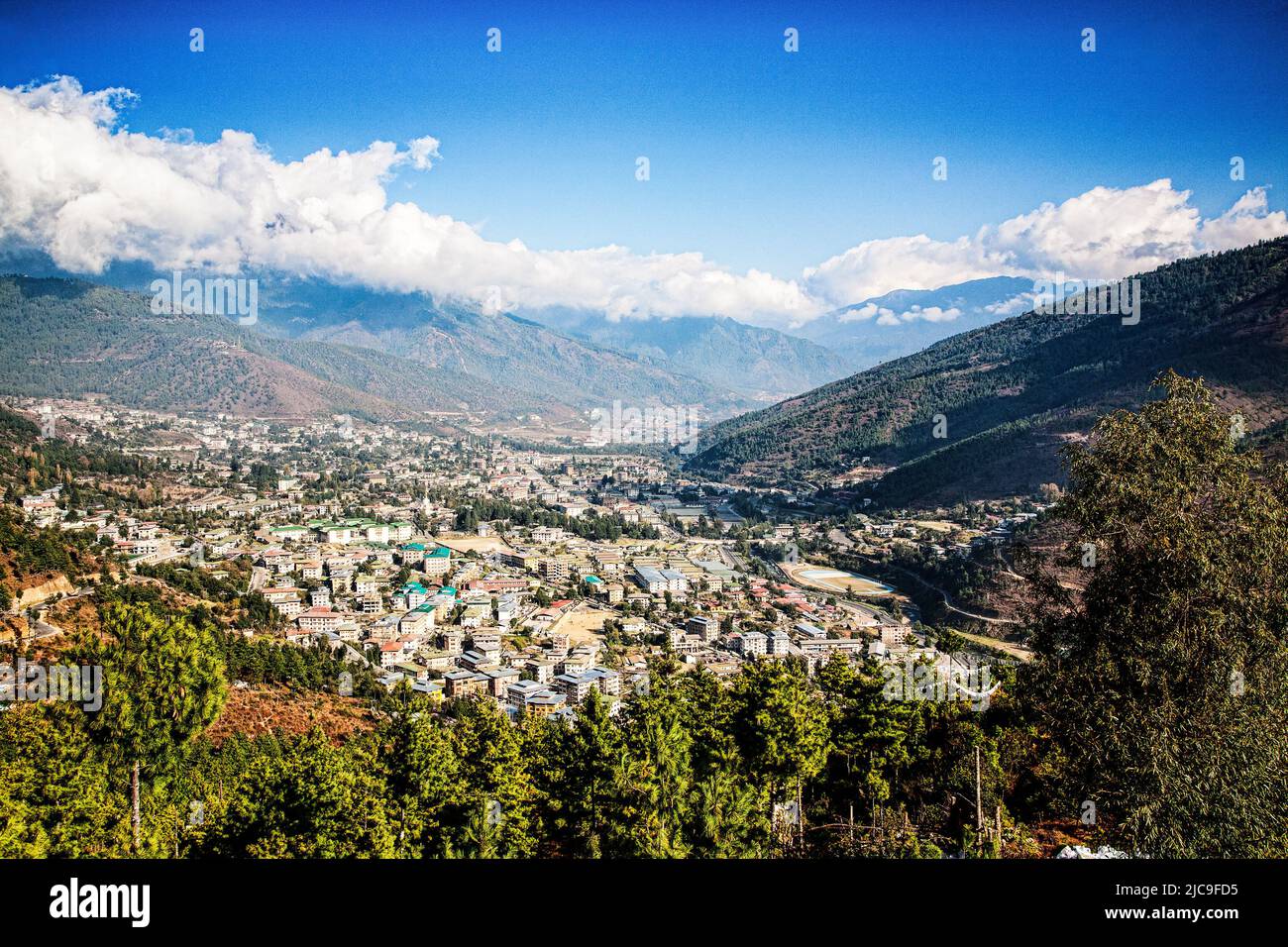 The capital city Thimphu sits in a mountain valley in Bhutan. Stock Photo