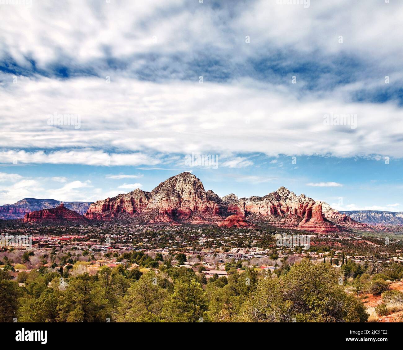Red Rock formations rise from the landscape bordering West Sedona, Arizona. Stock Photo