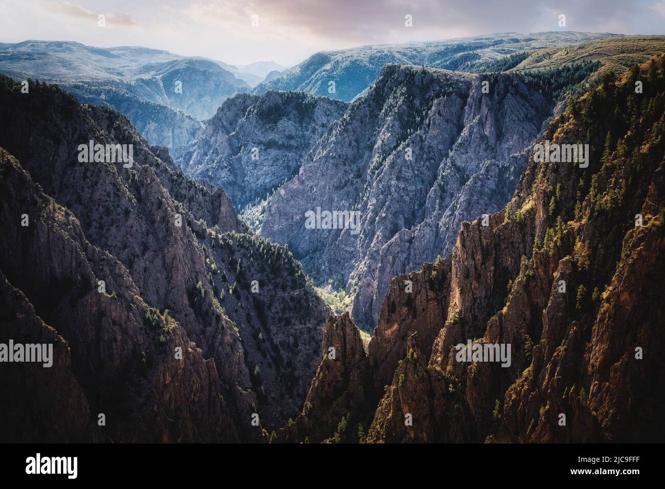 A deep gorge becomes the Black Canyon of the Gunnison National Park in southwestern Colorado, USA. Stock Photo