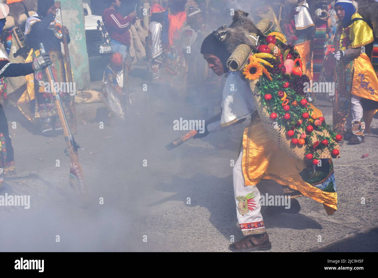Guns being fired during Carnaval in Huejotzingo, Puebla Mexico Stock Photo