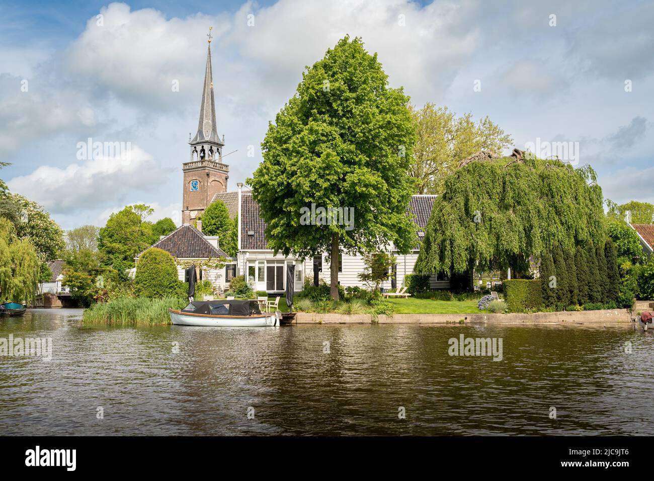 Picturesque dutch tourist village Broek in Waterland seen from the boat Stock Photo