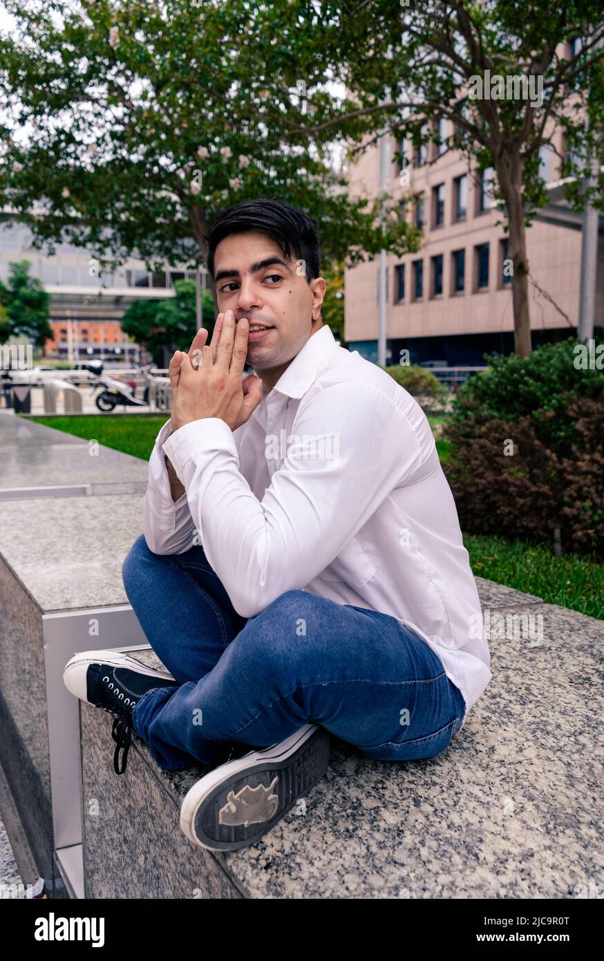 Relaxed man sitting on armchair hi-res stock photography and images - Alamy