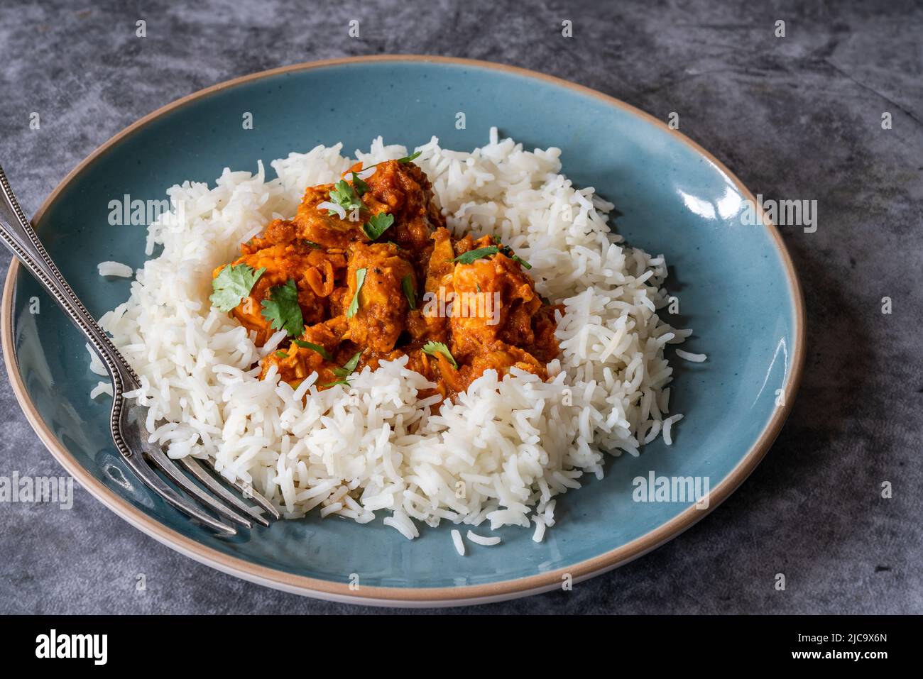 Parsi fish patia with rice - delicious curry from the Parsi community in Bombay Stock Photo