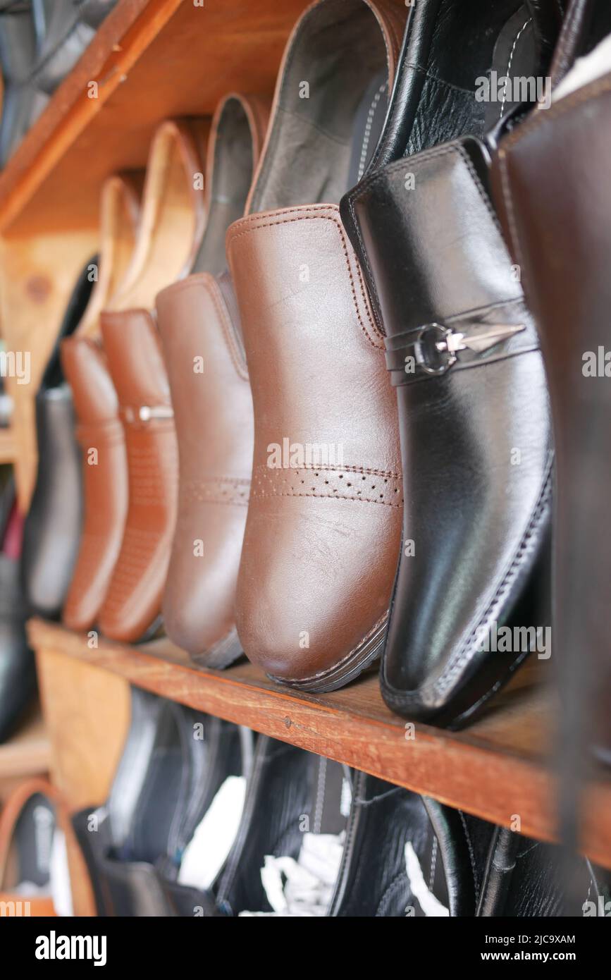 shoes display for sale at local store Stock Photo Alamy